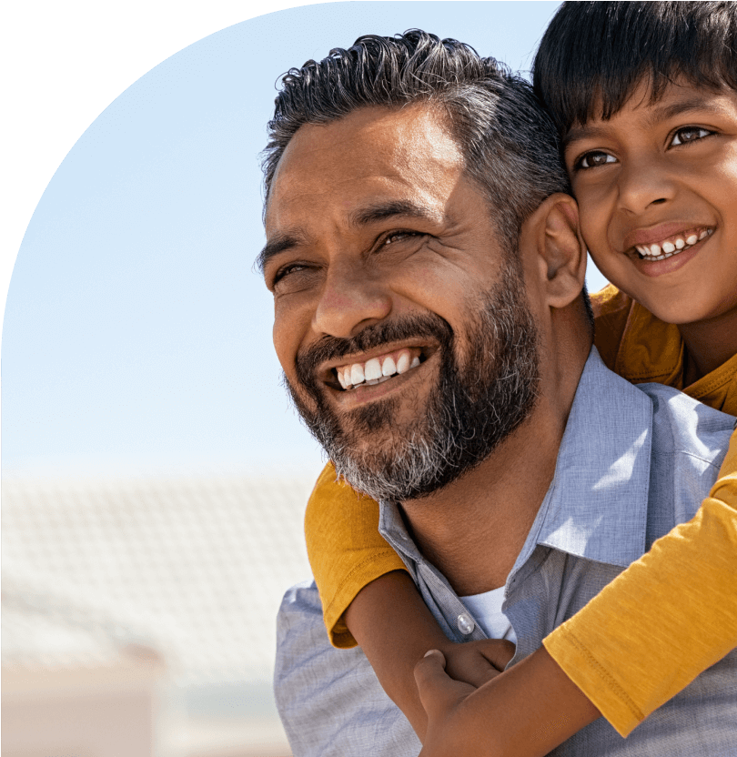 Smiling father and son